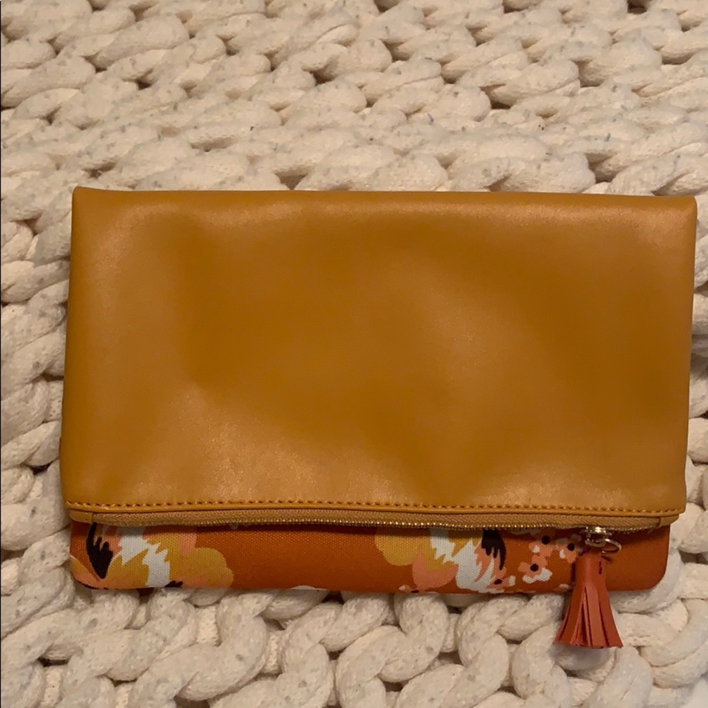 Never used floral orange clutch!